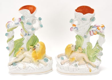 Staffordshire pair of spill vases with lion