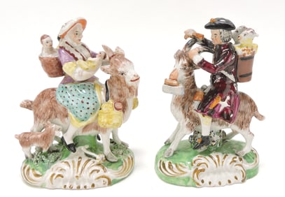 Pearlware pair of a couple riding goats