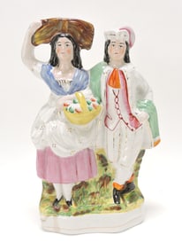 Staffordshire figure of man and woman