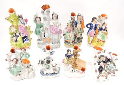 Staffordshire lot of 8 figural spill vases,