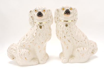 Staffordshire pair of white spaniels,