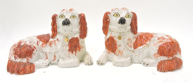 Staffordshire pair of recumbent russet