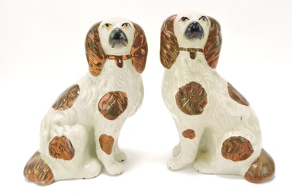 Staffordshire pair of luster spaniels,