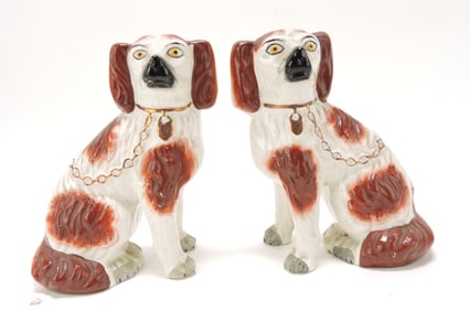 Staffordshire pair of free leg seated