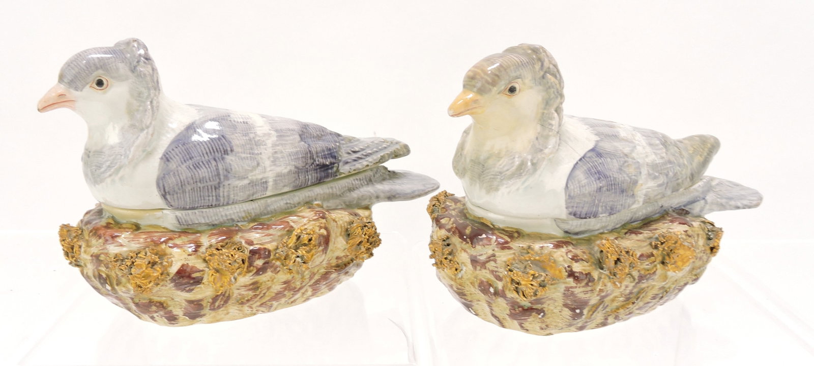 Staffordshire pair of covered pigeon: dishes, 4 1/2" x 6 1/2", repairs to inside flange of both lids