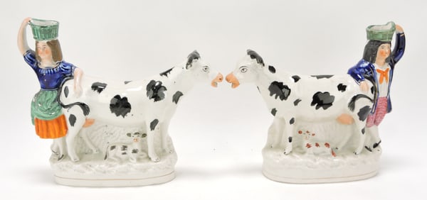 Staffordshire pair of cow with calf and