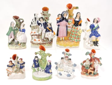 Staffordshire lot of 8 figural spill vases,