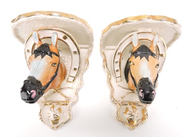 Staffordshire pair of horse bracket shelves,
