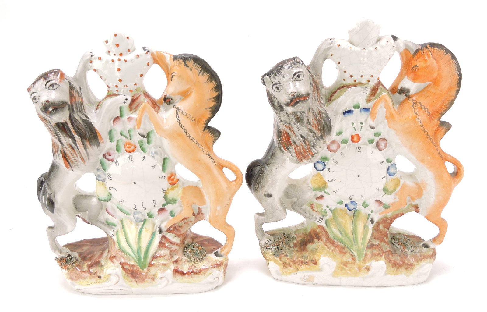 Staffordshire pair of Royal Arms clock: figures with horse and lion, 9 1/2"