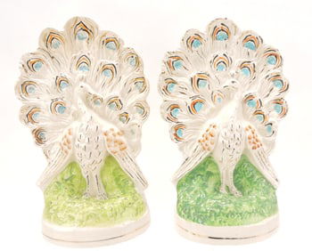 Staffordshire pair of peacock figures,