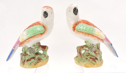 Staffordshire pair of exotic bird figures,