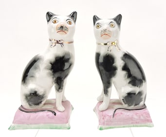 Staffordshire pair of seated cats on