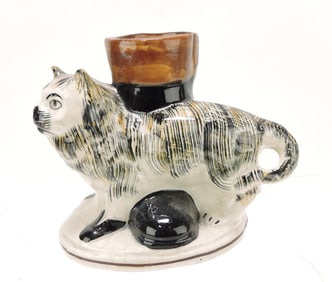 Staffordshire cat with boot figure, 5"