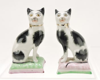 Staffordshire pair of seated cats on