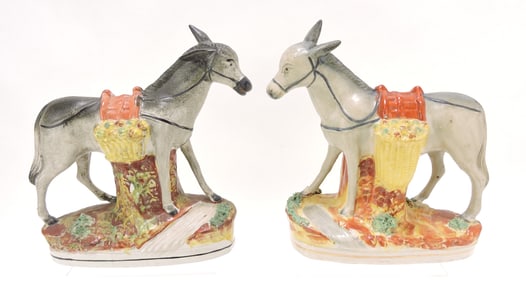 Staffordshire pair of donkey figures with