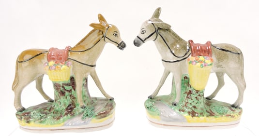 Staffordshire pair of donkey figures with