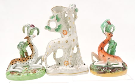 Staffordshire lot of 3 giraffe figures,
