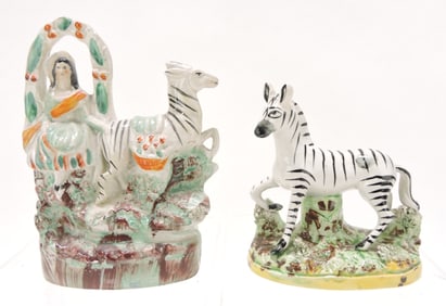 Staffordshire lot of 2 zebra figures,