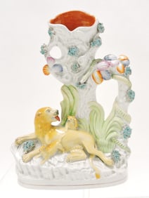 Staffordshire lion with cubs spill vase,