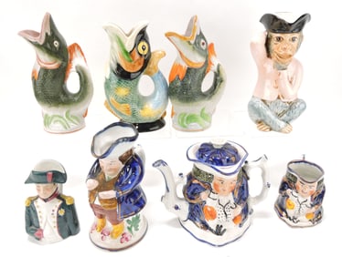 Lot of 8 figural jugs and teapot,