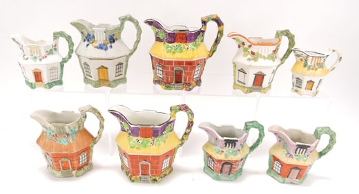 Staffordshire lot of 9 cottage pitchers,