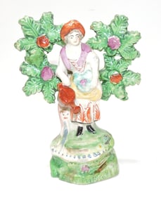 Staffordshire figure of Little Lady Gardener