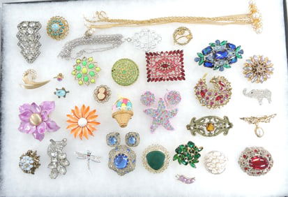 Tray of brooches