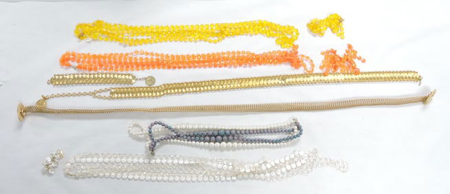 Lot of belts, necklaces, and earrings