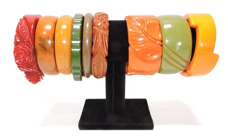 Bakelite style lot of 9 carved/shaped