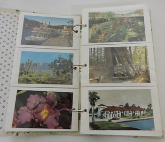 Postcard album with 280 +/- cards,
