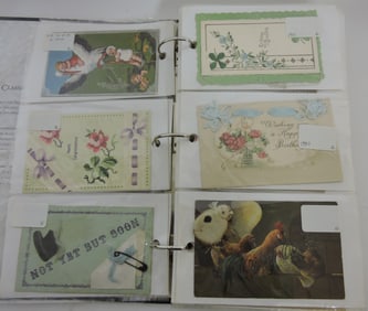 Postcard album with 210 +/- cards,