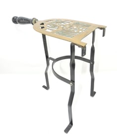 Brass and iron fireplace iron warmer,