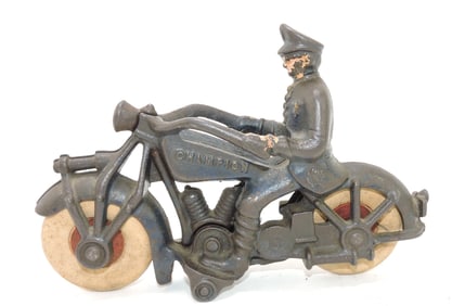 Champion cast iron motorcycle cop,