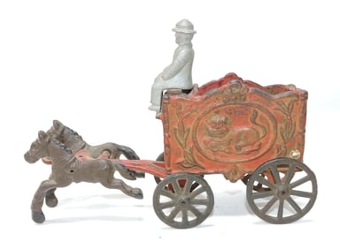 Cast iron horse drawn circus wagon,