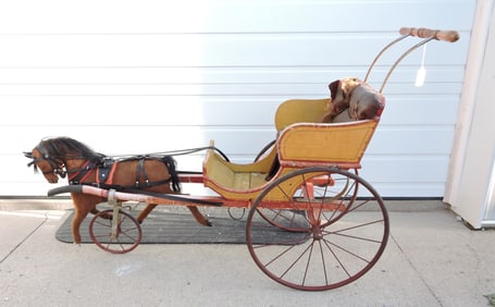Wooden horse drawn baby buggy,