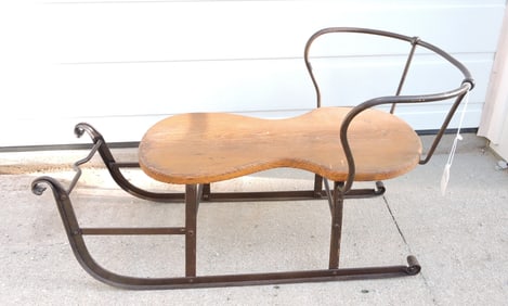 Iron sled with wooden seat, 29"