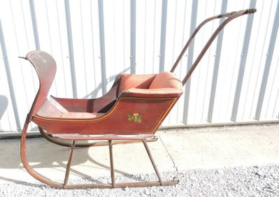Early child's sled with stenciling,