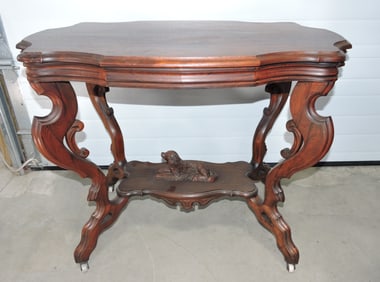 Walnut Victorian parlor table with
