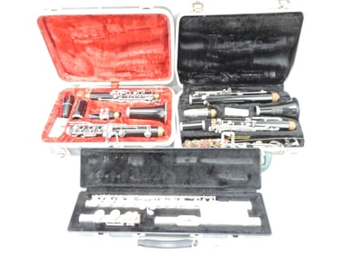 Lot of 2 clarinets and 1 flute,