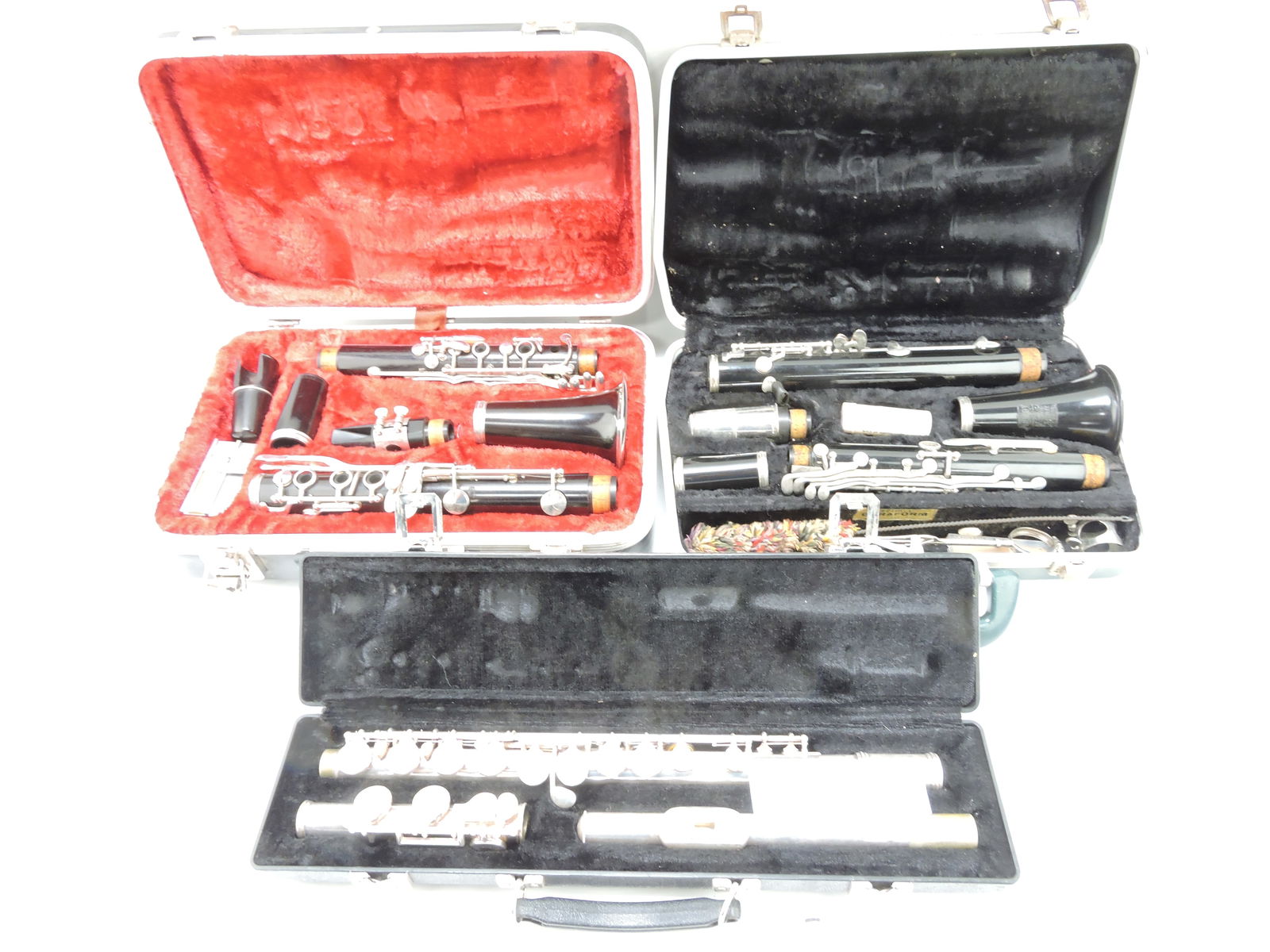 Lot of 2 clarinets and 1 flute,: all with cases