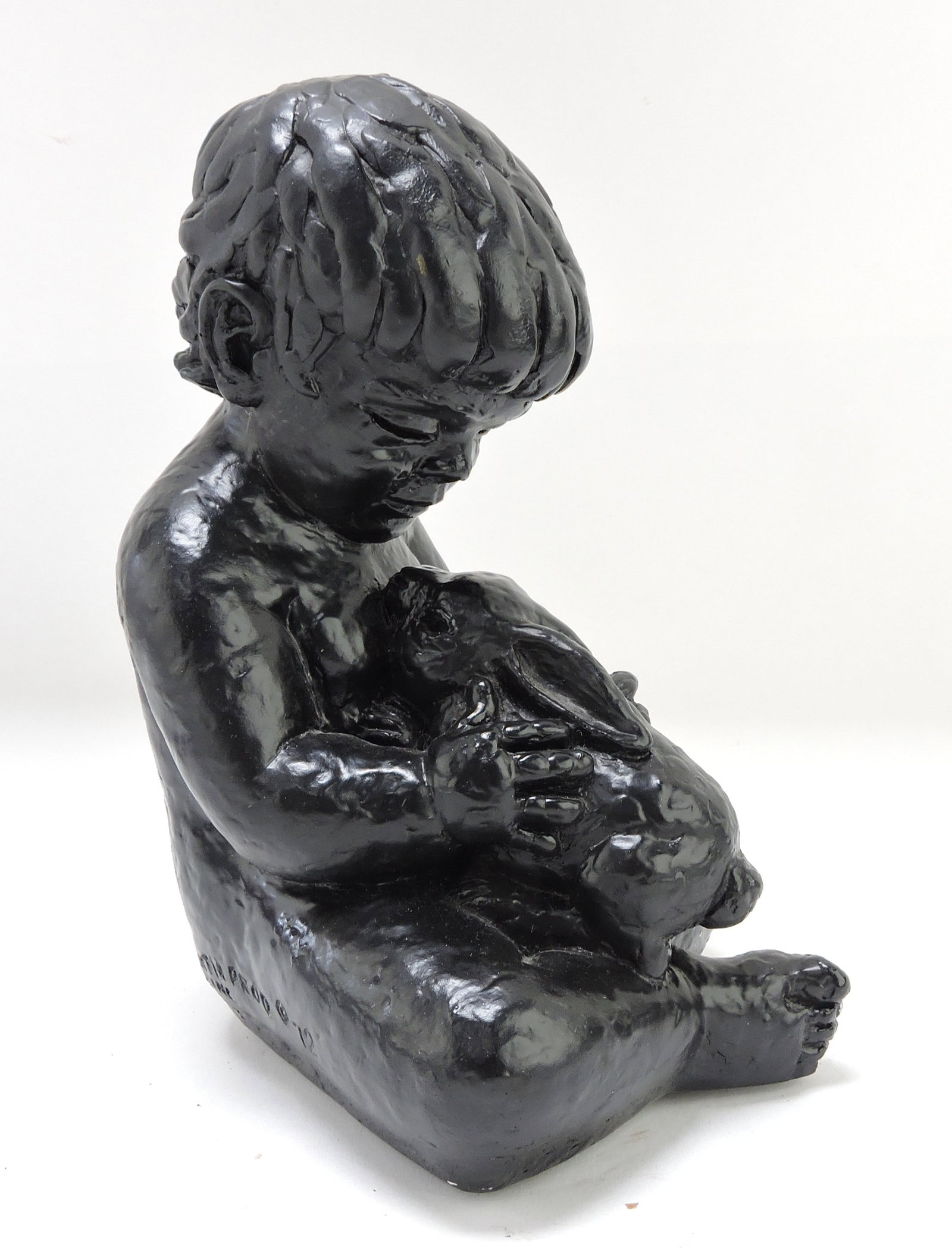 Austin Prod sculpture of child with: bunny, 10", 1972