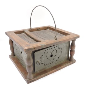 Primitive pierced tin and wood