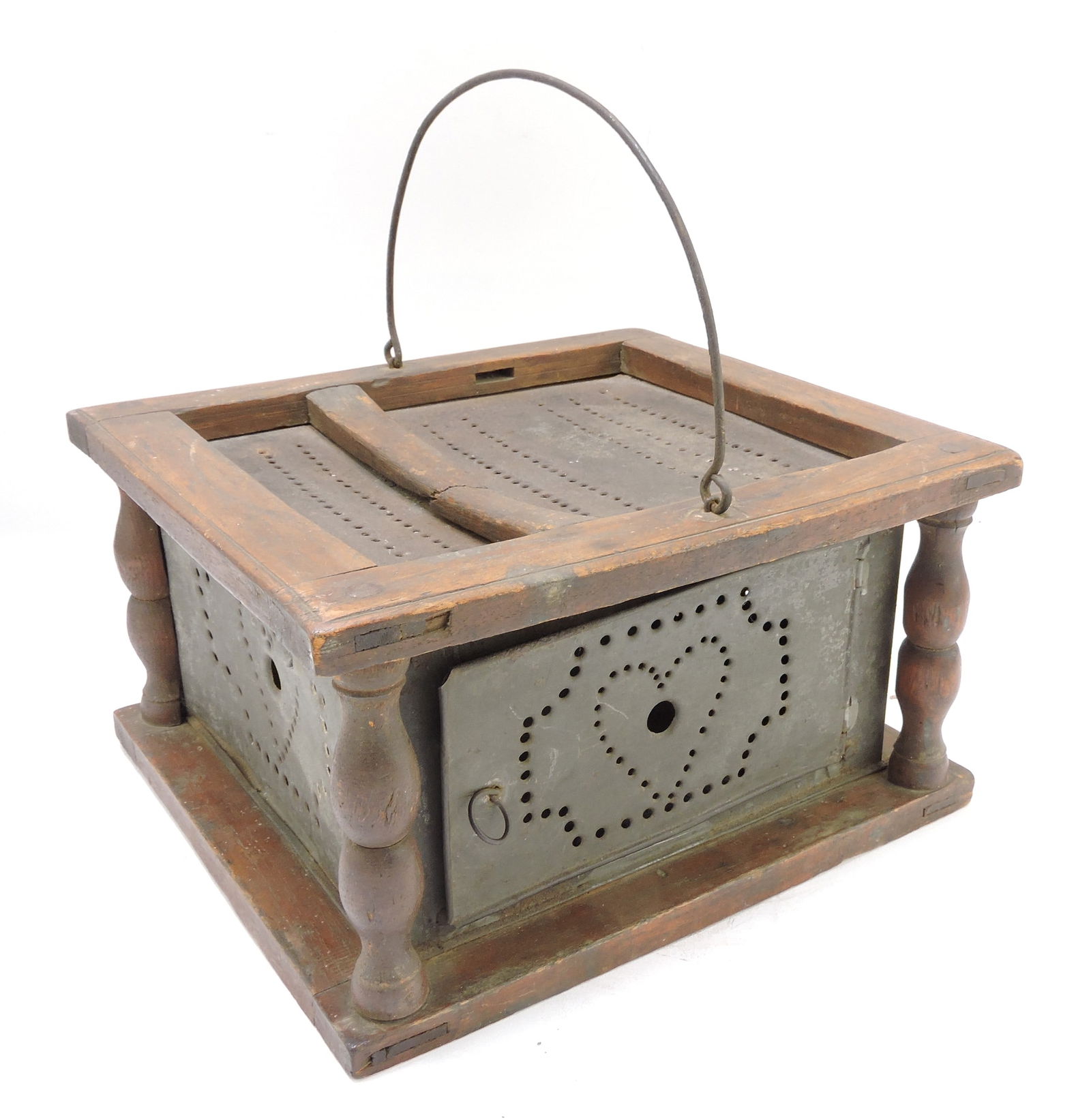 Primitive pierced tin and wood (1 of 2)