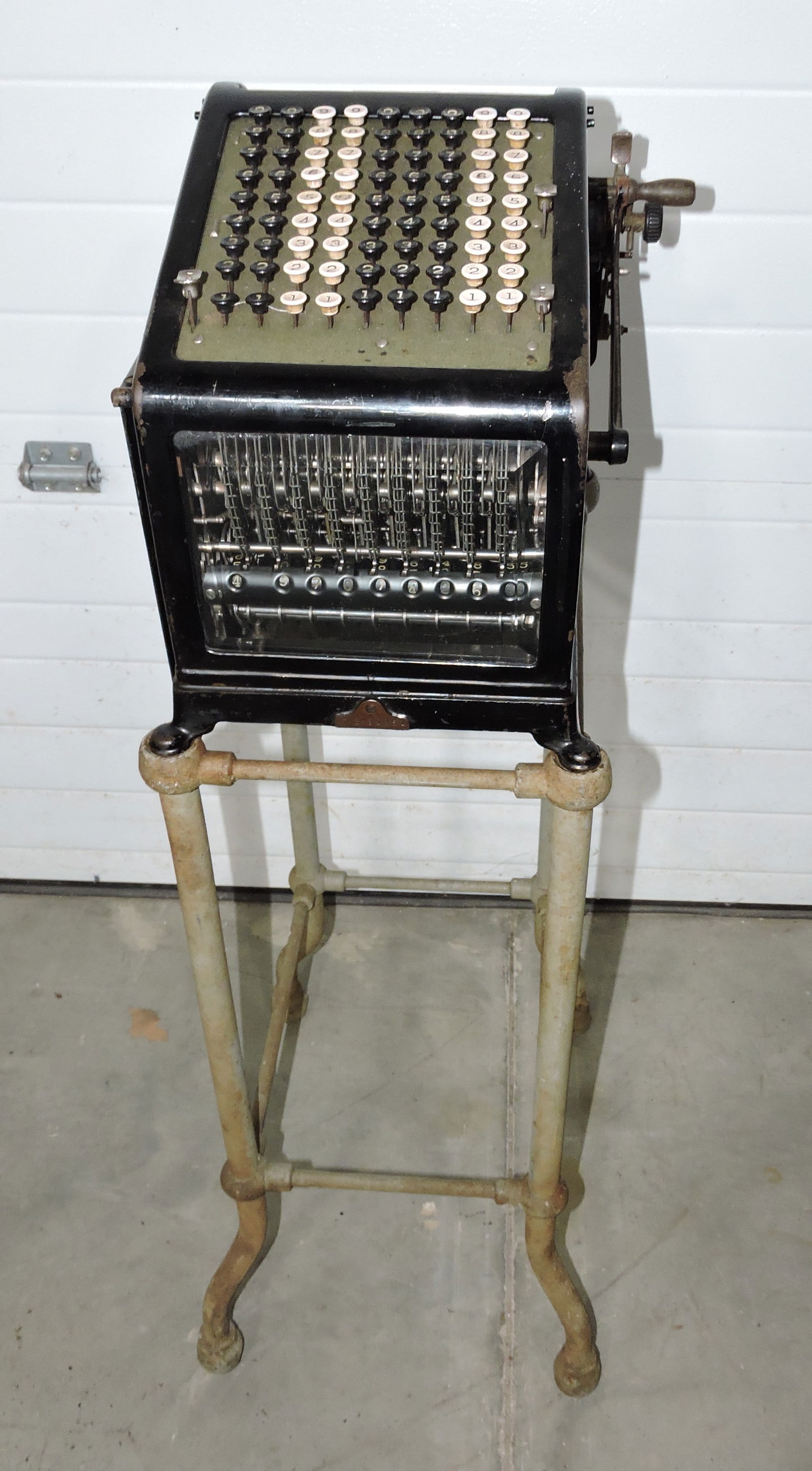 Early adding machine on stand, (1 of 3)