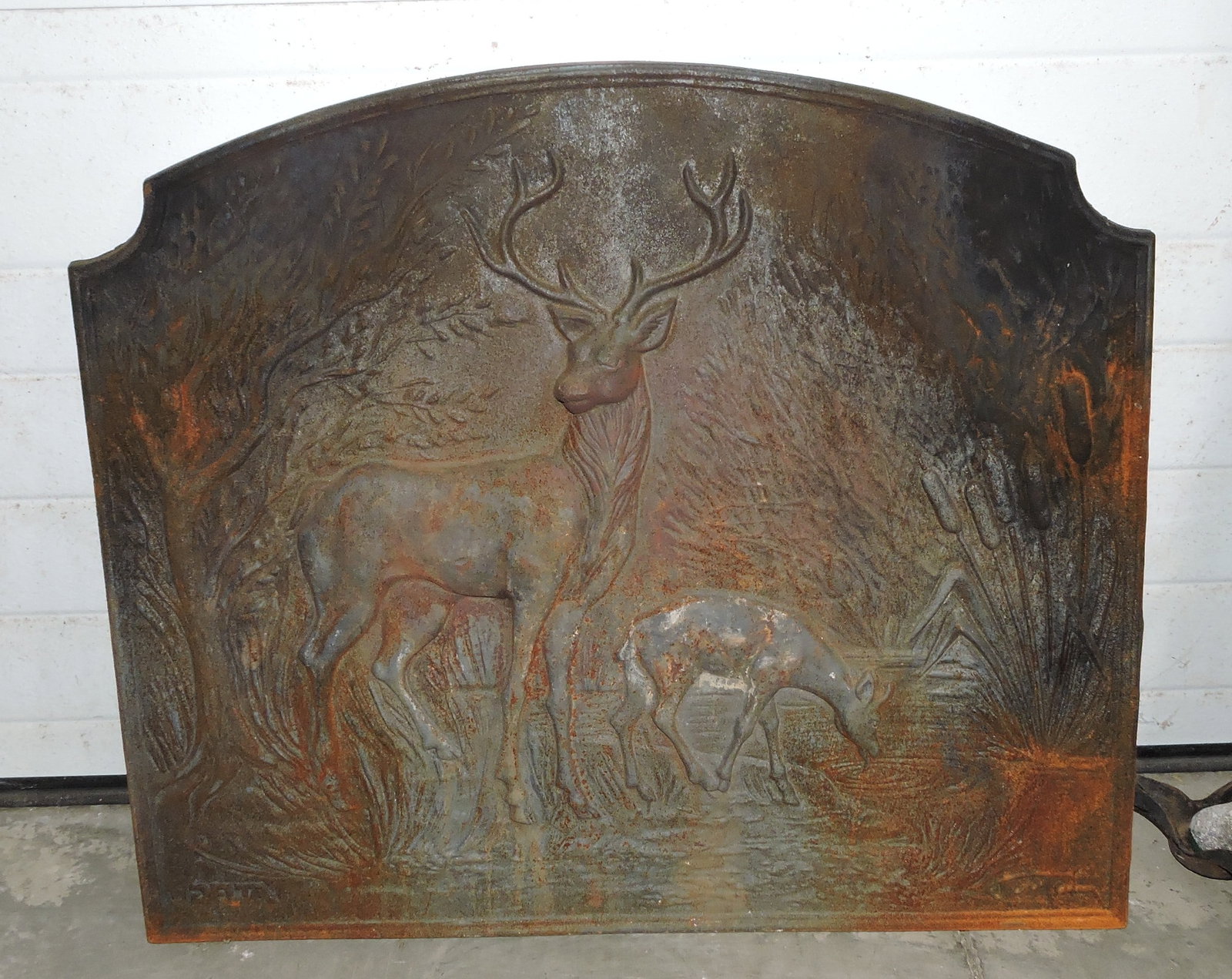 Cast iron fireplace front with deer: in forest, 24"h, 28"w