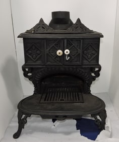 Cast iron miniature stove, 21"h,