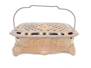 Cast iron foot warmer, 11 1/2"w