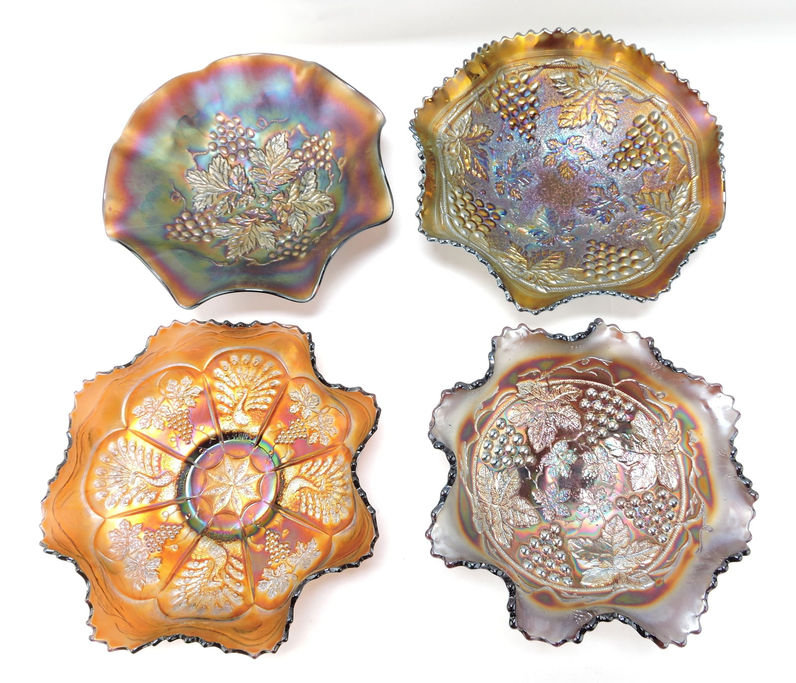 Carnival glass lot of 4 amethyst: bowls, 8" to 9"