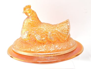 Marigold carnival glass hen on nest,