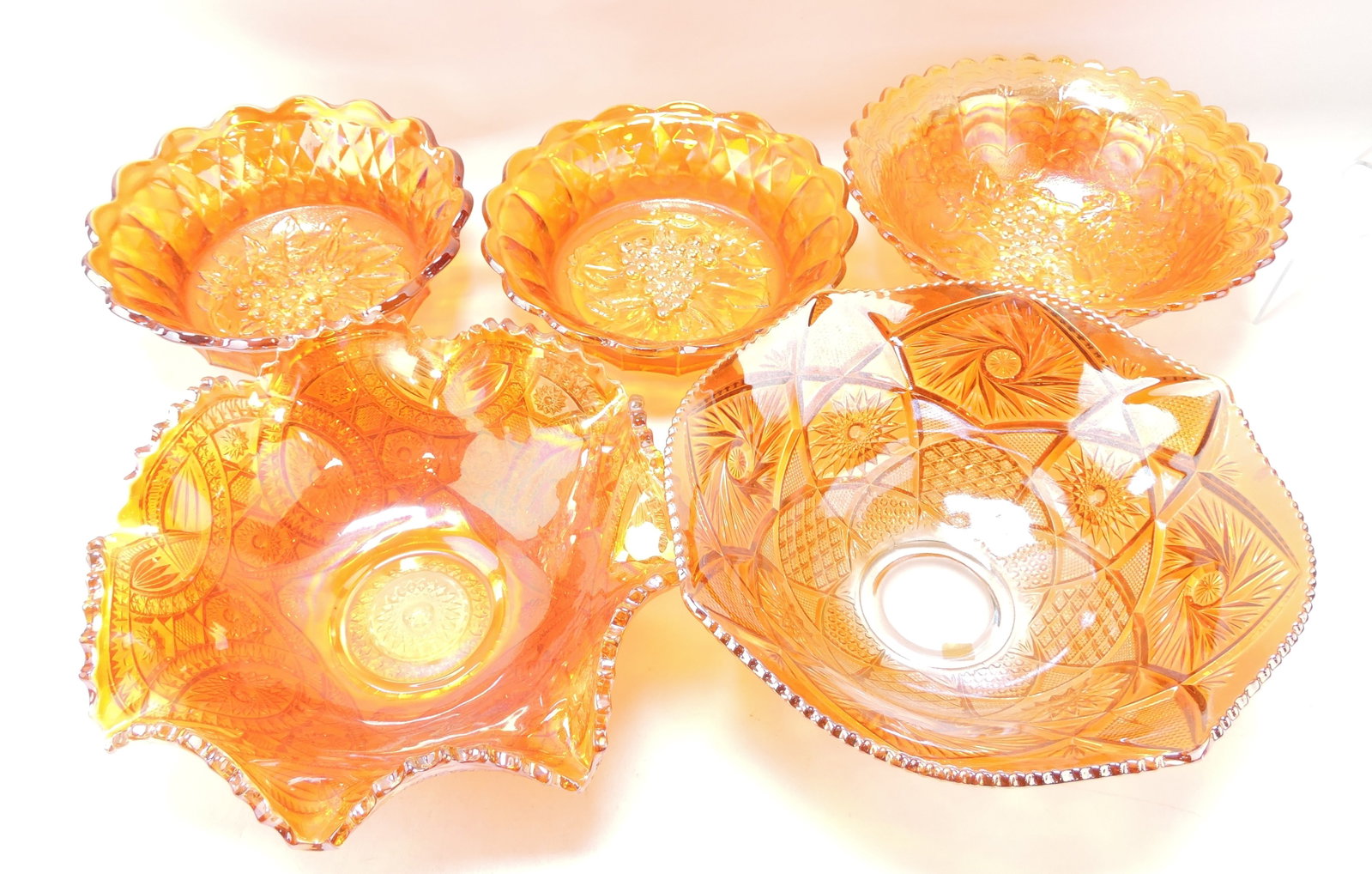 Marigold carnival glass lot of 5 bowls,: 9" to 11"